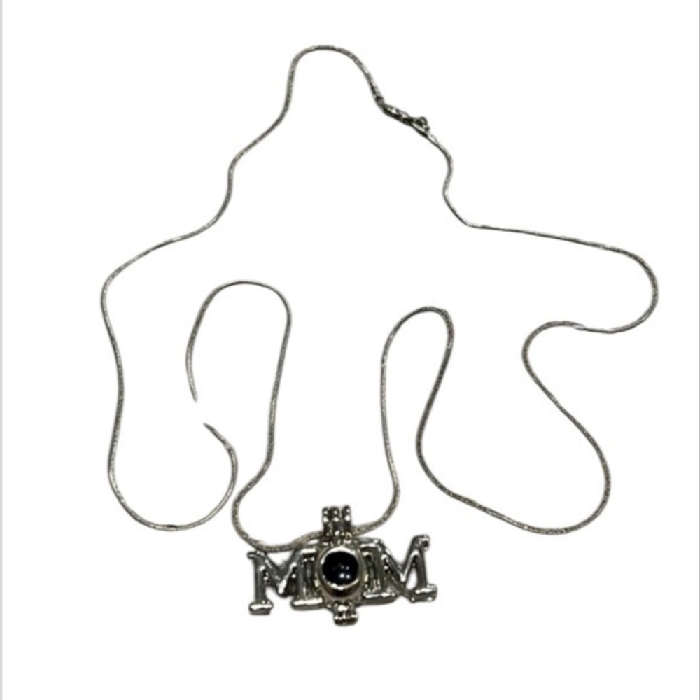 Genuine Pearl in a MOM Pearl cage with 24in chain